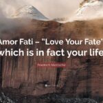 A qoute "love your fate" with a scenic mountainous background- clouds and ice sourounding the mountain top.