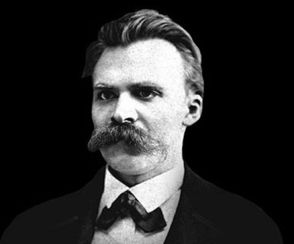 R (1) A black and white potrait of the great german philosopher Fredrick Neitzsche with his glorious moustach adding to the allure of the potrait.